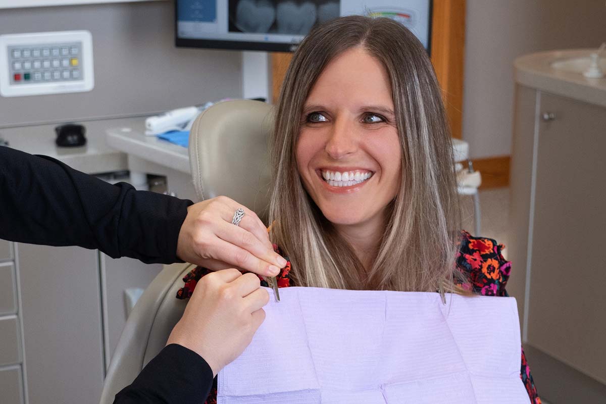Dr. Walker discussing dental veneers with a new patient